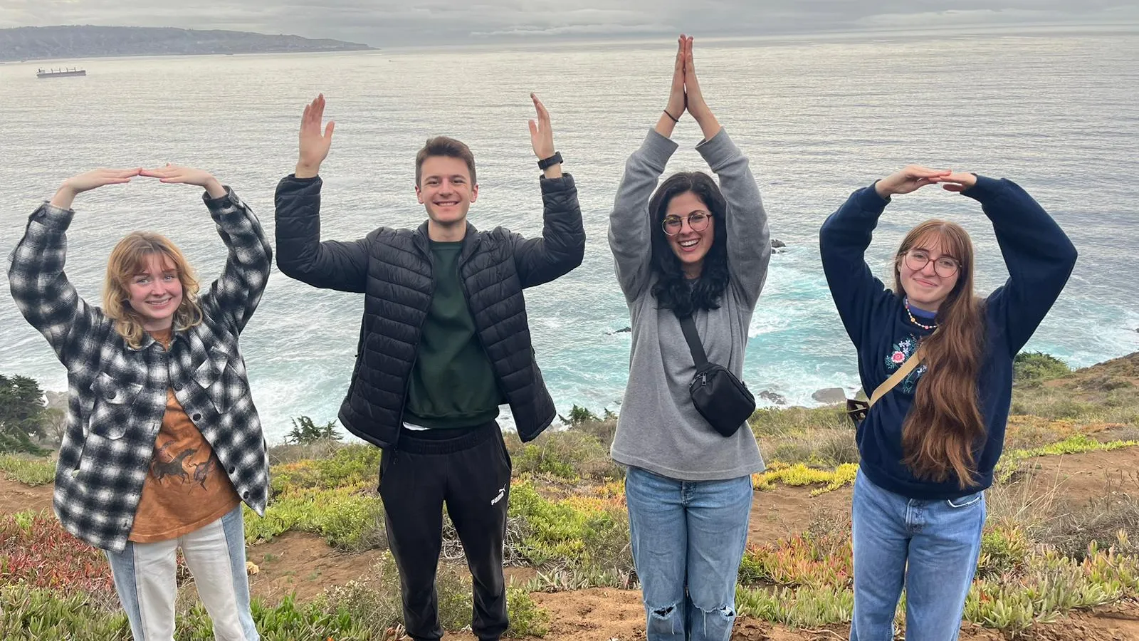 four people posing with O-H-I-O