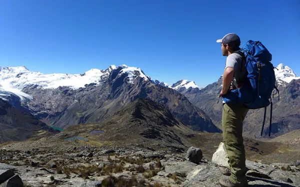 Graduate student looks over mountains